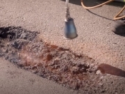Reparation af større huller i asfalt, AggreFill